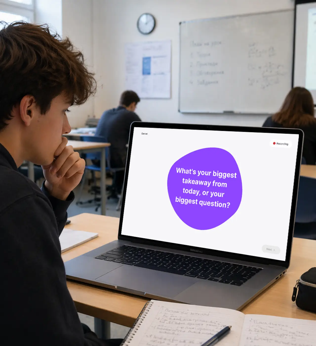 Student in classroom working with MirrorTalk on laptop